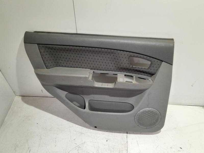 Recambio de guarnecido puerta trasera izquierda para kia carens 2.0 turbodiesel cat referencia OEM IAM 0K2FB68550Z6  