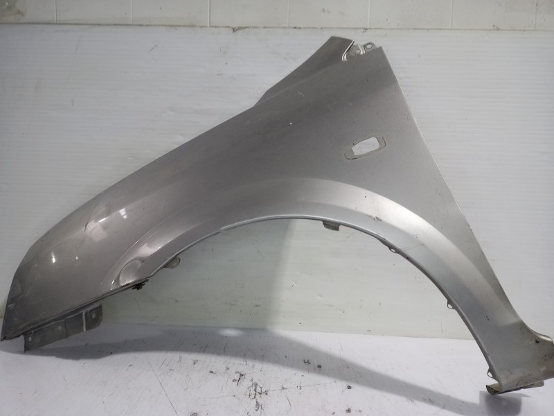 Recambio de aleta delantera izquierda para kia carens 2.0 turbodiesel cat referencia OEM IAM 0K2FA-52212  