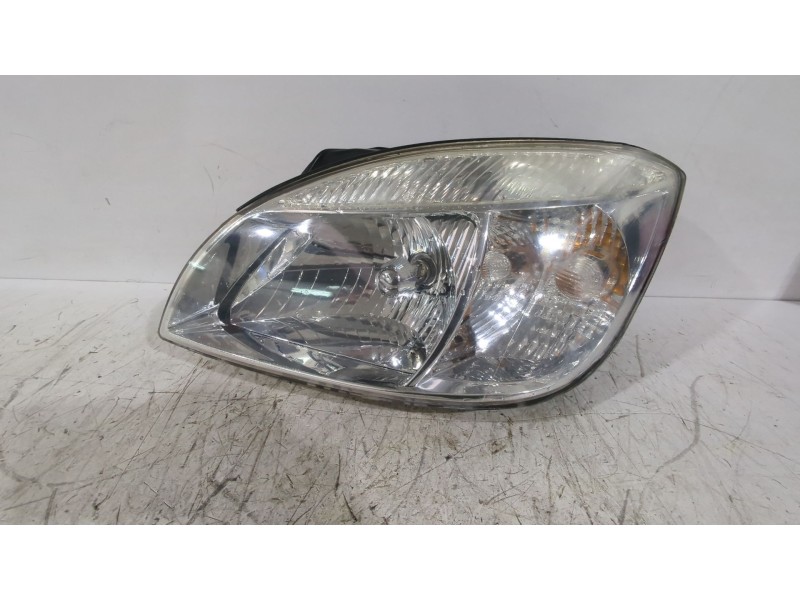 Recambio de faro izquierdo para kia rio ii (jb) 1.5 crdi referencia OEM IAM 921011G020  
