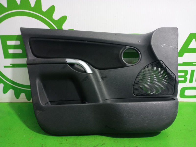 Recambio de guarnecido puerta delantera izquierda para citroën c3 1.4 hdi sx referencia OEM IAM 9332C9  