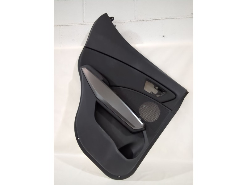 Recambio de guarnecido puerta trasera izquierda para ssangyong tivoli 1.5 referencia OEM IAM 7321035000  