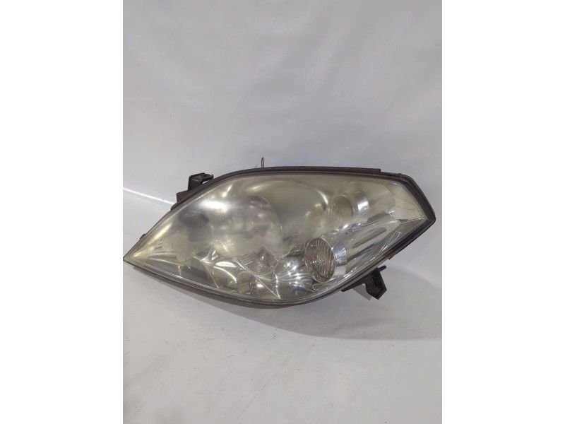 Recambio de faro izquierdo para nissan primera hatchback (p12) 1.6 referencia OEM IAM 26060AU80B  