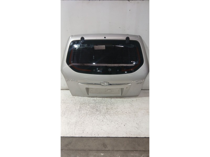 Recambio de porton trasero para hyundai tucson (jm) 2.0 crdi referencia OEM IAM 737002E050  