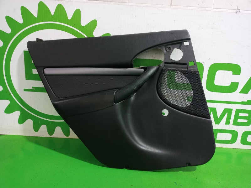 Recambio de guarnecido puerta trasera izquierda para ford focus berlina (cak) trend referencia OEM IAM 1311264  