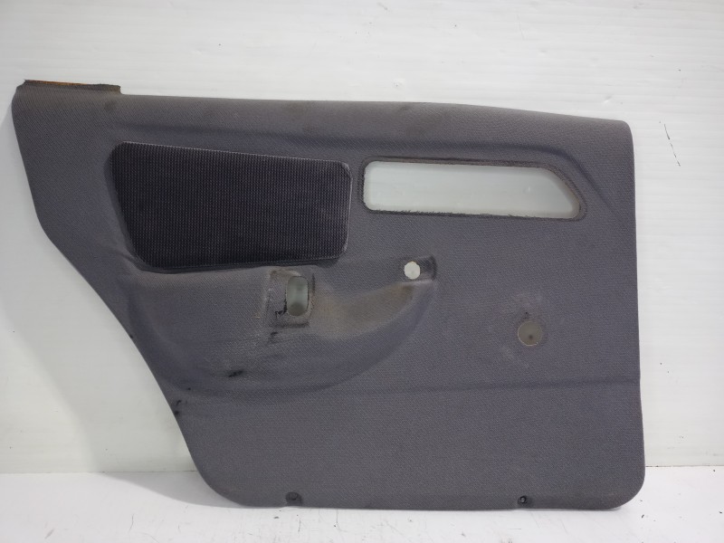 Recambio de guarnecido puerta trasera izquierda para ford sierra berlina brillant referencia OEM IAM 1666695  