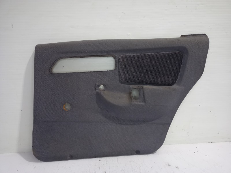 Recambio de guarnecido puerta trasera derecha para ford sierra berlina brillant referencia OEM IAM 1666694  