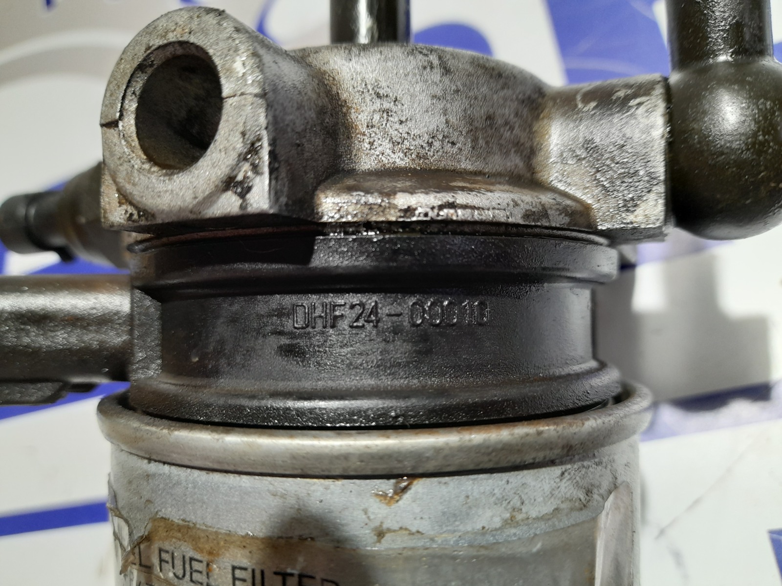 soporte_filtro_gasoil_dhf2400010_hyundai_getz_tb_1_5_crdi_cat