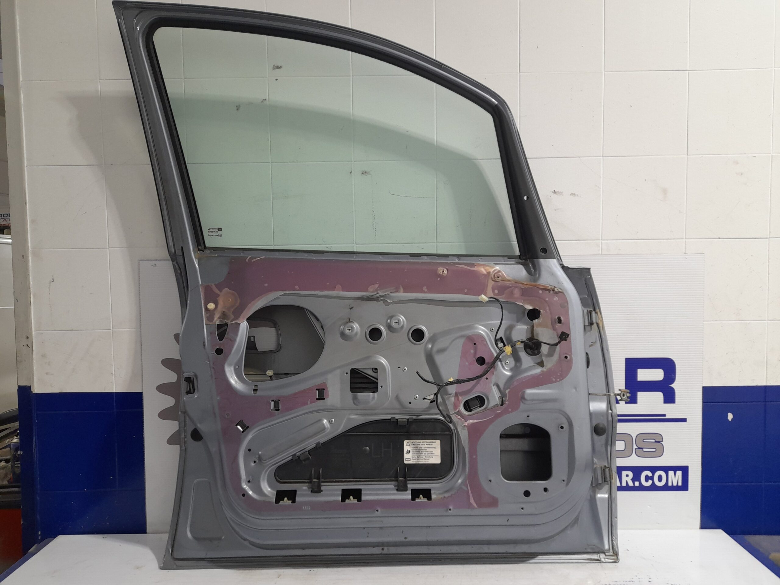 puerta_delantera_izquierda_13116447_opel_zafira_a_elegance