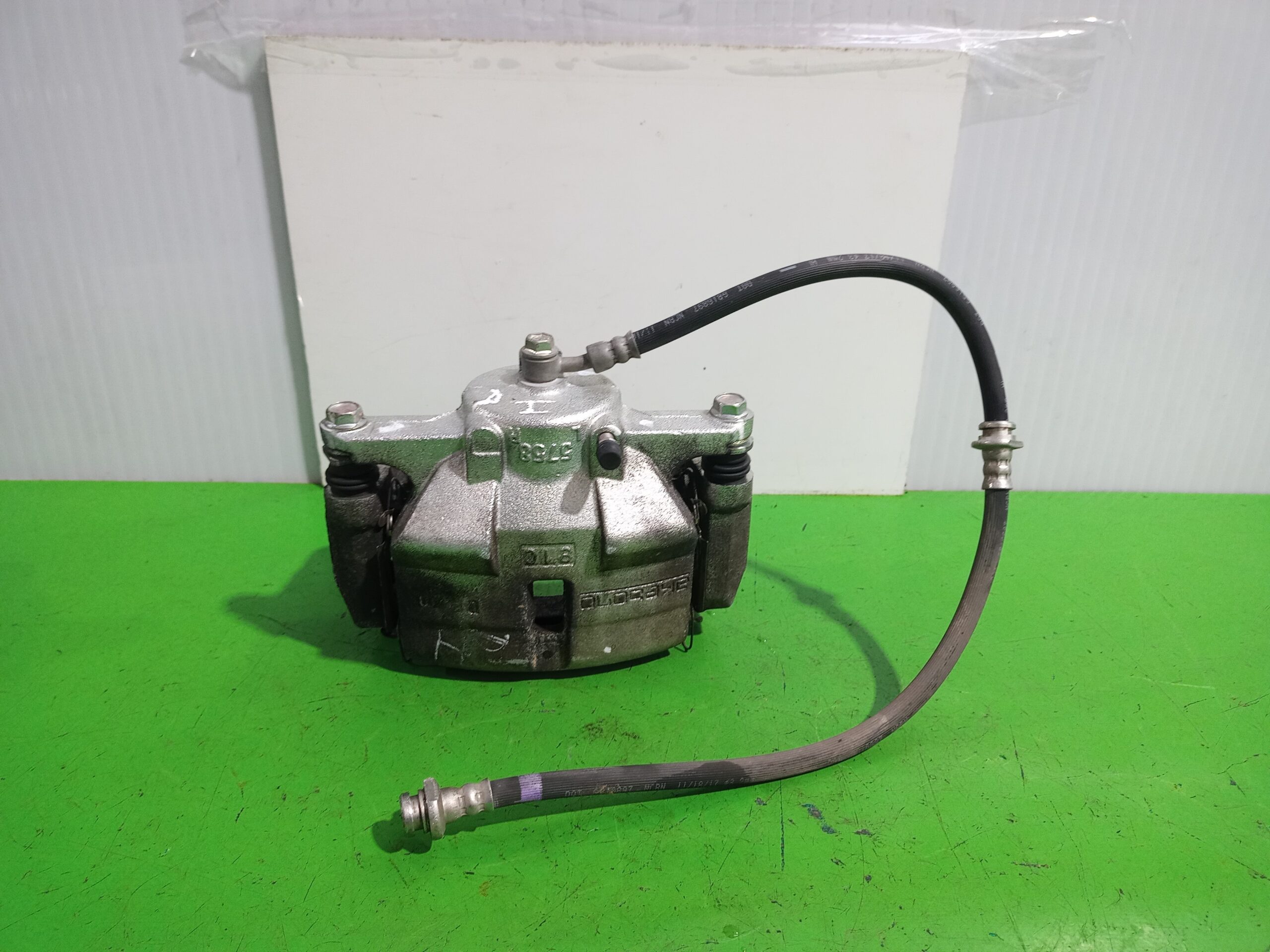 pinza_de_freno_delantera_izquierda_410114ea0a_nissan_qashqai_j11_acenta