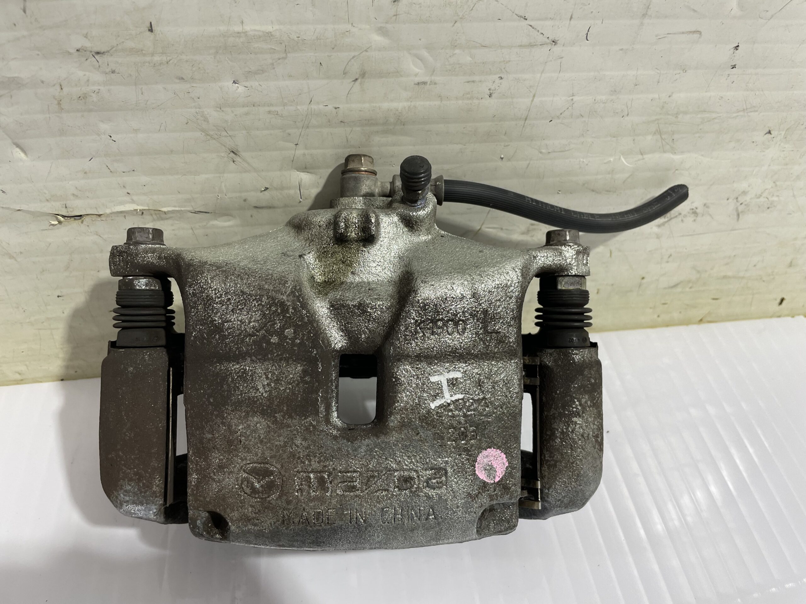 pinza_de_freno_delantera_izquierda_b4y73399zb_mazda_3_lim_center_line