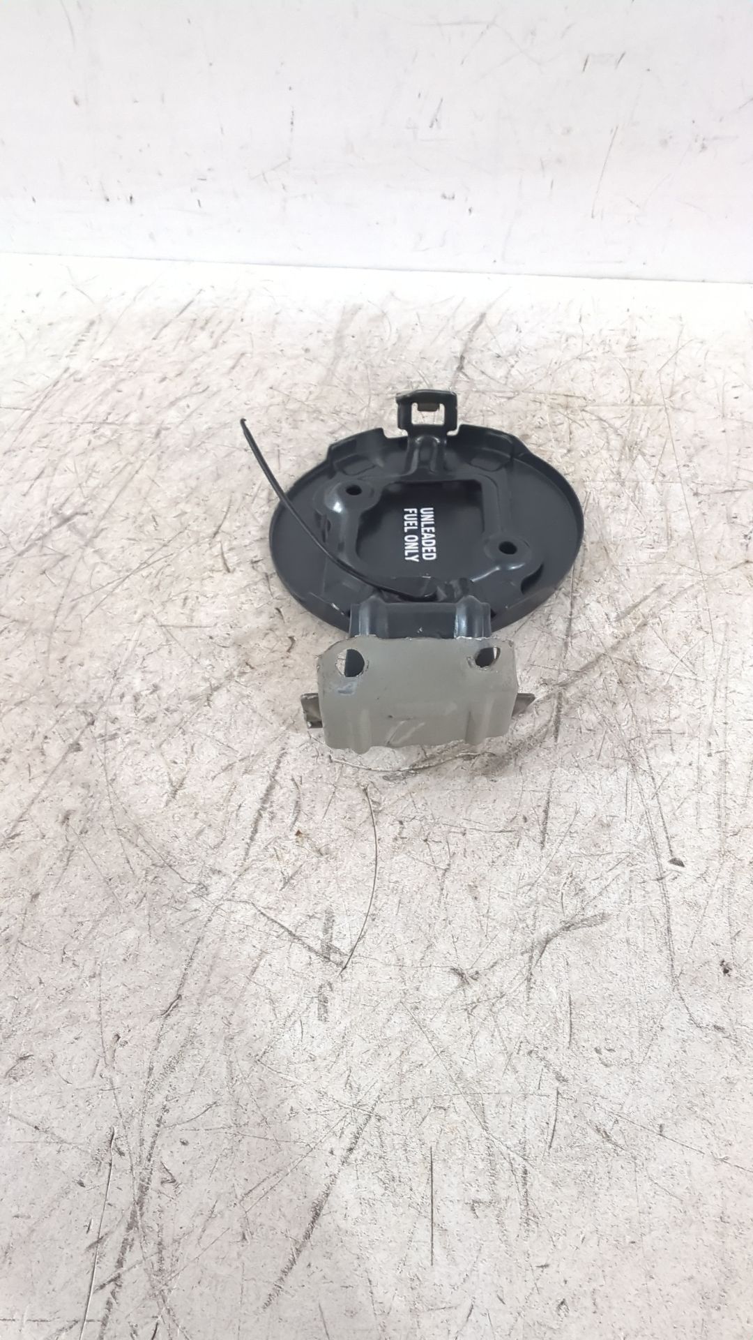 tapa_exterior_combustible_7735002100_toyota_auris_e15_1_6_zre151