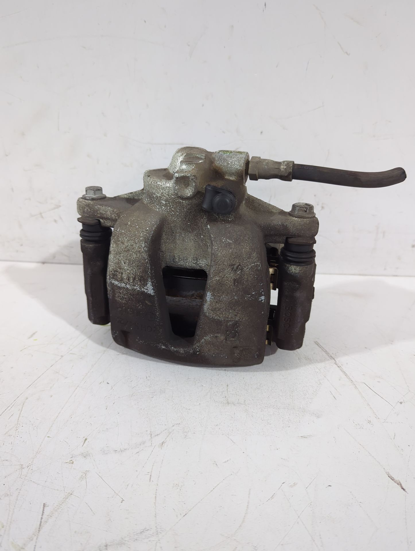 pinza_de_freno_delantera_izquierda_542544_opel_corsa_d_s07_1_3_cdti_l08_l68